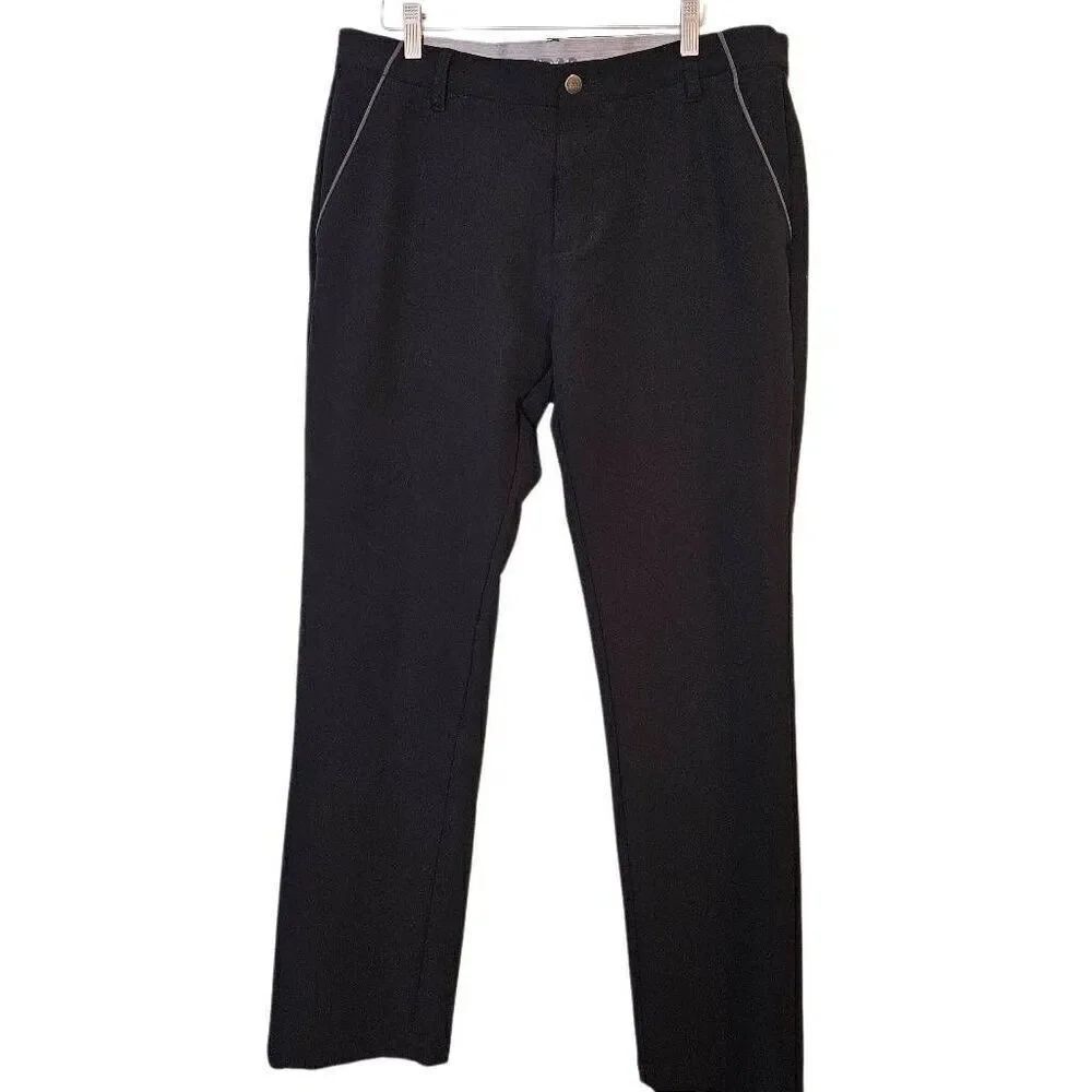 Adidas men's pants, black with gray trim on pockets. 34X32. #808